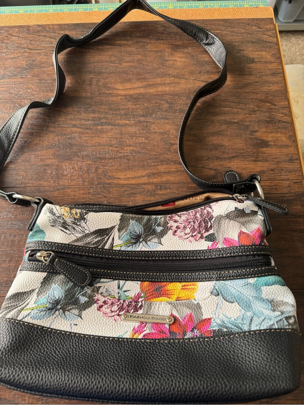 Stone Mountain Accessories Floral Crossbody in Black and Multicolor Accents